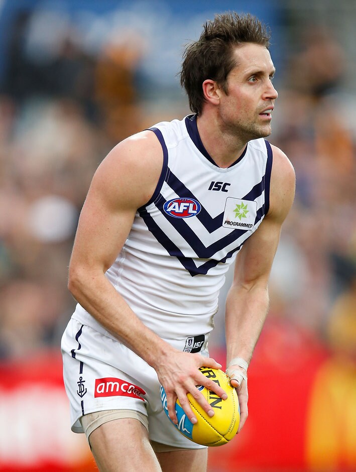 AFL 2015 Rd 15 - Hawthorn v Fremantle LAUNCESTON, AUSTRALIA - JULY 12: Luke McPharlin of the Dockers, playing his 250th match in action during the 2015 AFL round 15 match between the Hawthorn Hawks and the Fremantle Dockers at Aurora Stadium, Launceston, Australia on July 12, 2015. (Photo by Michael Willson/AFL Media)